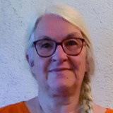 Frau mit Zopf